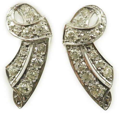 A pair of 18ct white gold and millegrain set diamond cluster scroll earrings